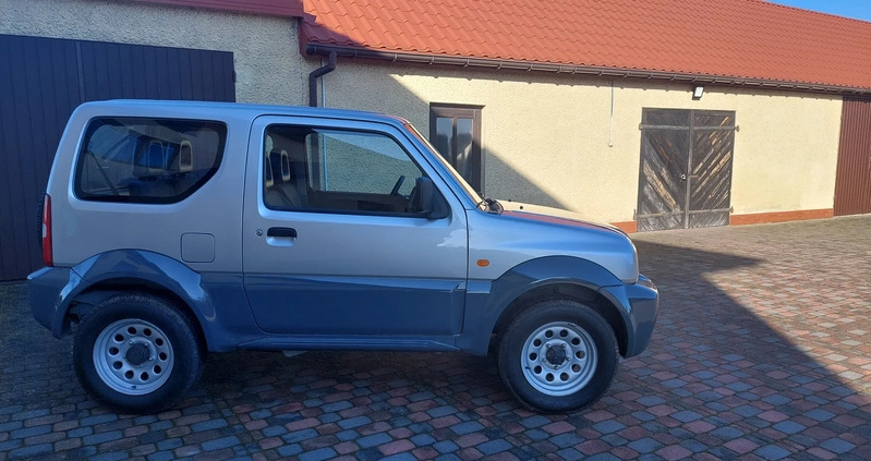 Suzuki Jimny cena 35700 przebieg: 155460, rok produkcji 2011 z Nidzica małe 211